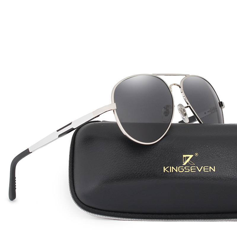 Gold aviator sunglasses with aluminum frame and polarized gray lenses beside KingSeven case on Tampa Home & Garden Store
