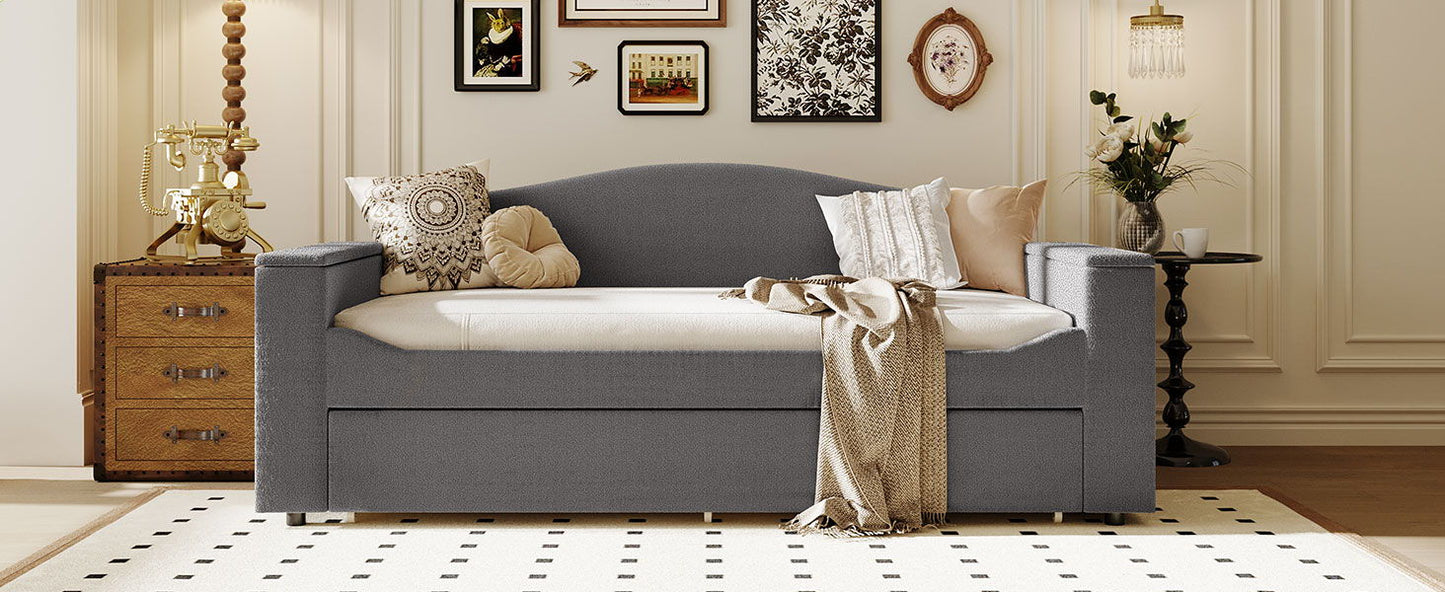 Upholstered gray daybed with storage armrests and built-in trundle, integrated audio on Tampa Home & Garden Store