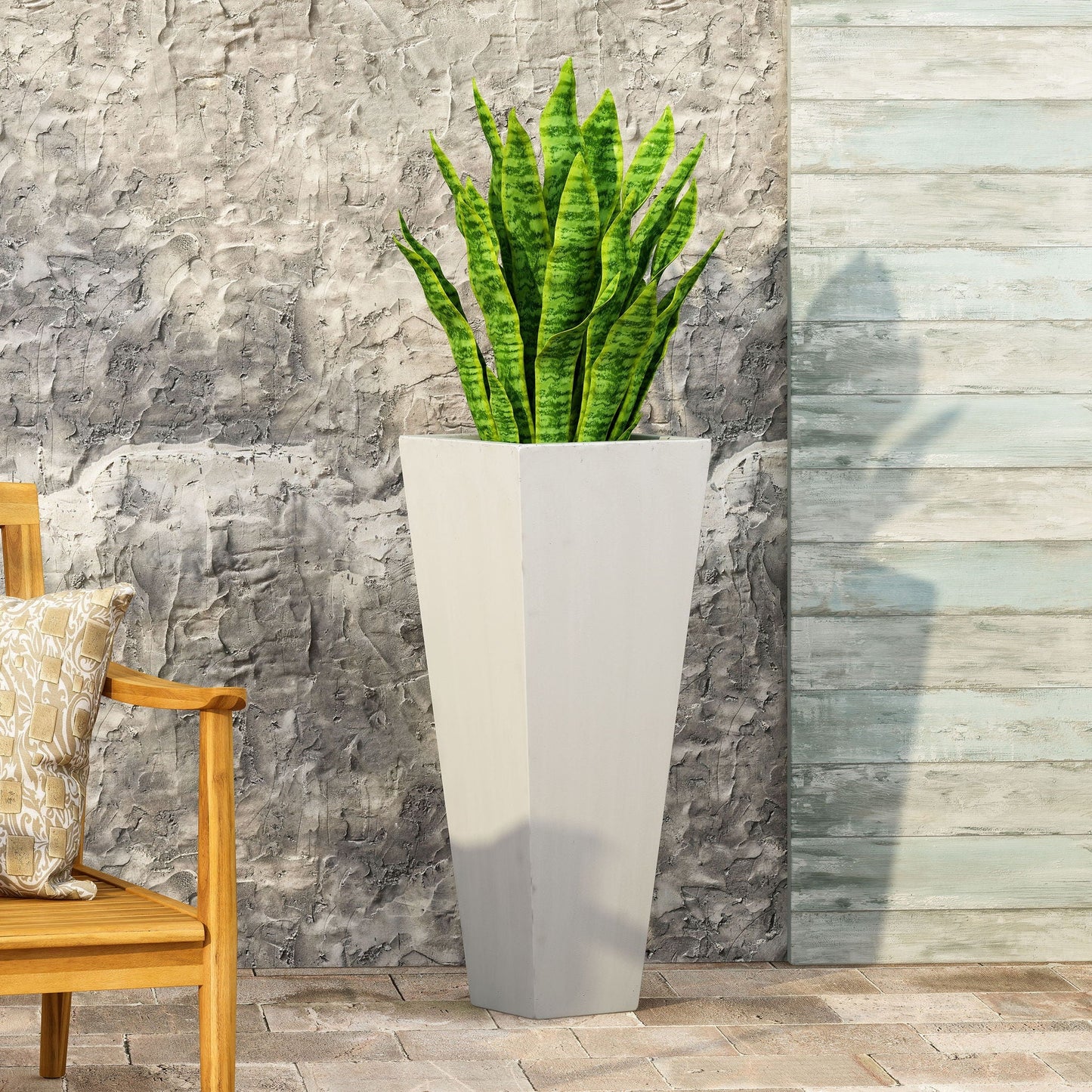 Outdoor Modern Cast Stone Planter by HouseOfZazla, white tapered planter with green snake plant on Tampa Home & Garden Store