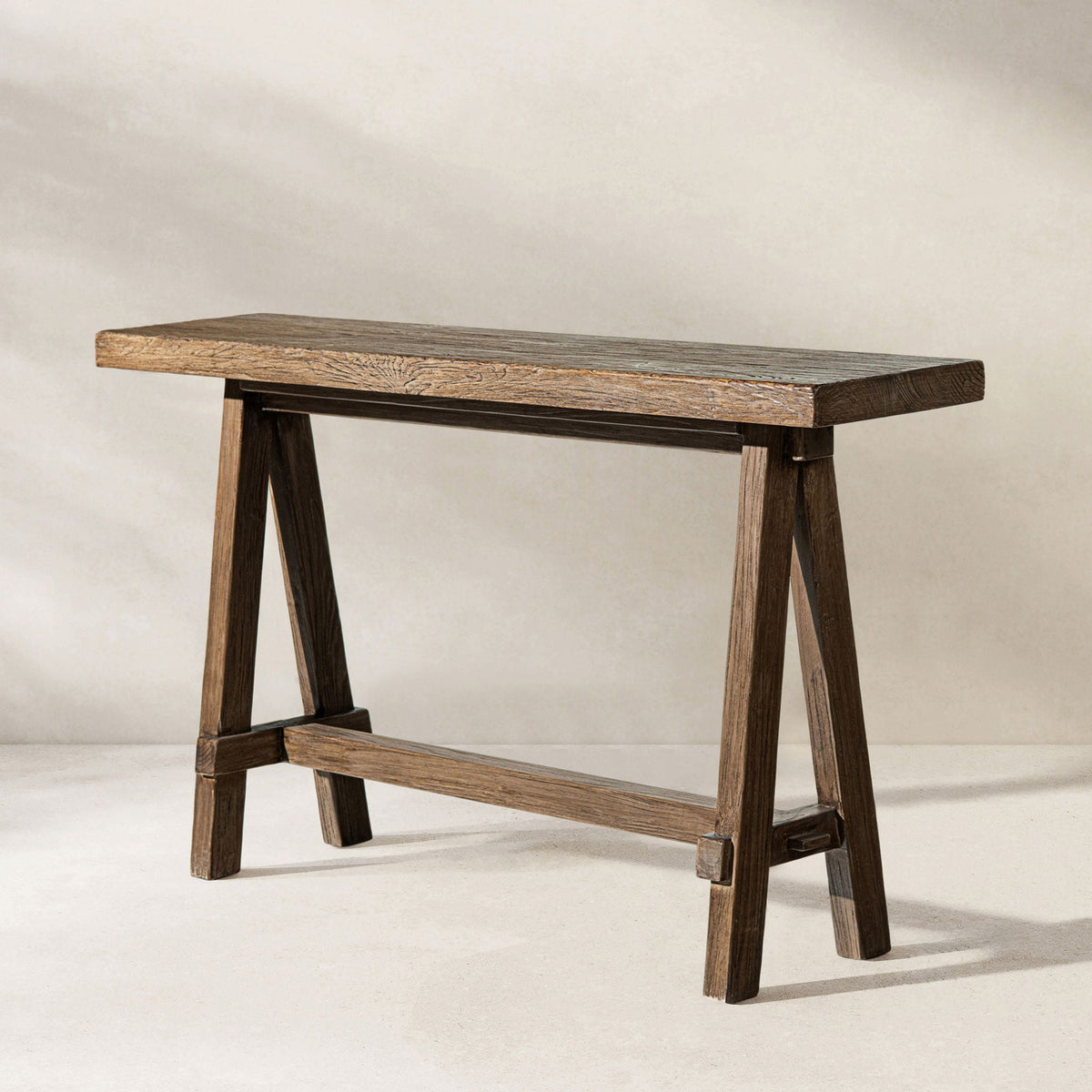 Trestle coffee table in reclaimed elm with dark brown finish and trestle legs by HouseOfZazla on Tampa Home & Garden Store