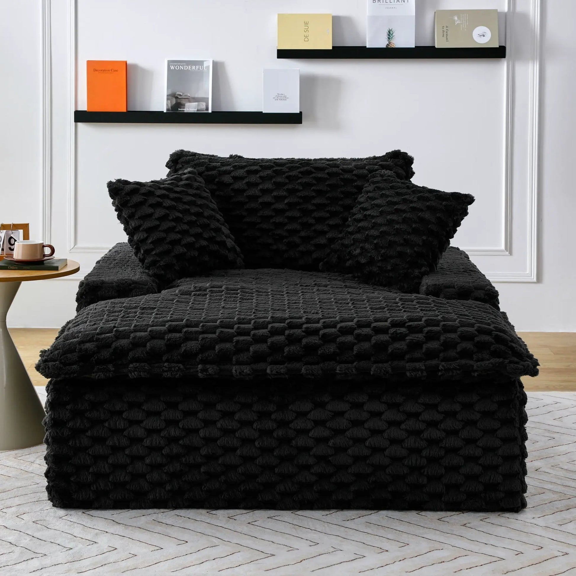 Harbor luxury turtle fleece sofa black plush cushions stacked on bed by Unique Furniture on Tampa Home & Garden Store