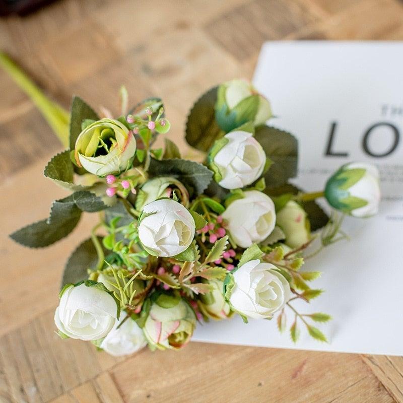 Stevvex 15-head silk tea rose bouquet with white blooms, green leaves and pink accents on Tampa Home & Garden Store