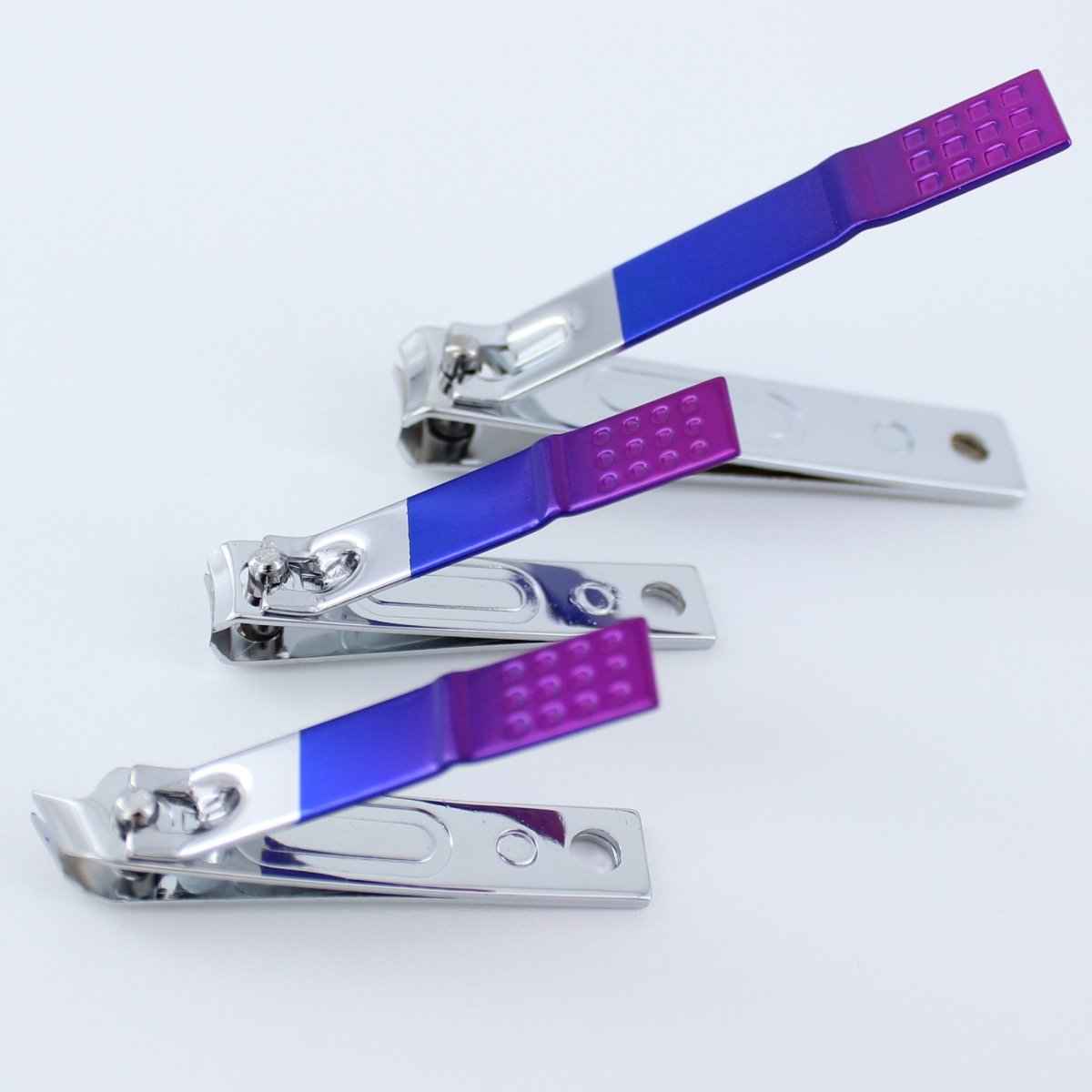 Four-piece nail clipper set featuring blue-purple gradient handles and shiny chrome blades on Tampa Home & Garden Store