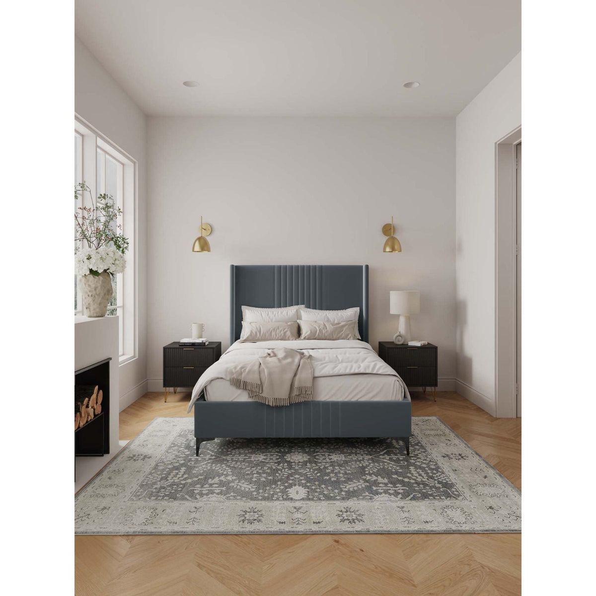 Promenade bed with blue-gray upholstered headboard and slats, black nightstands and sconces on Tampa Home & Garden Store