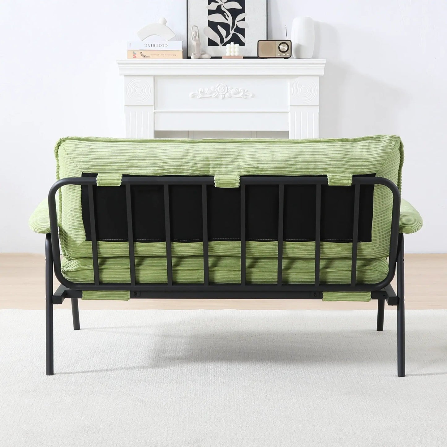 Modern metal frame stationary sofa with sponge-filled lime cushions and black frame on Tampa Home & Garden Store