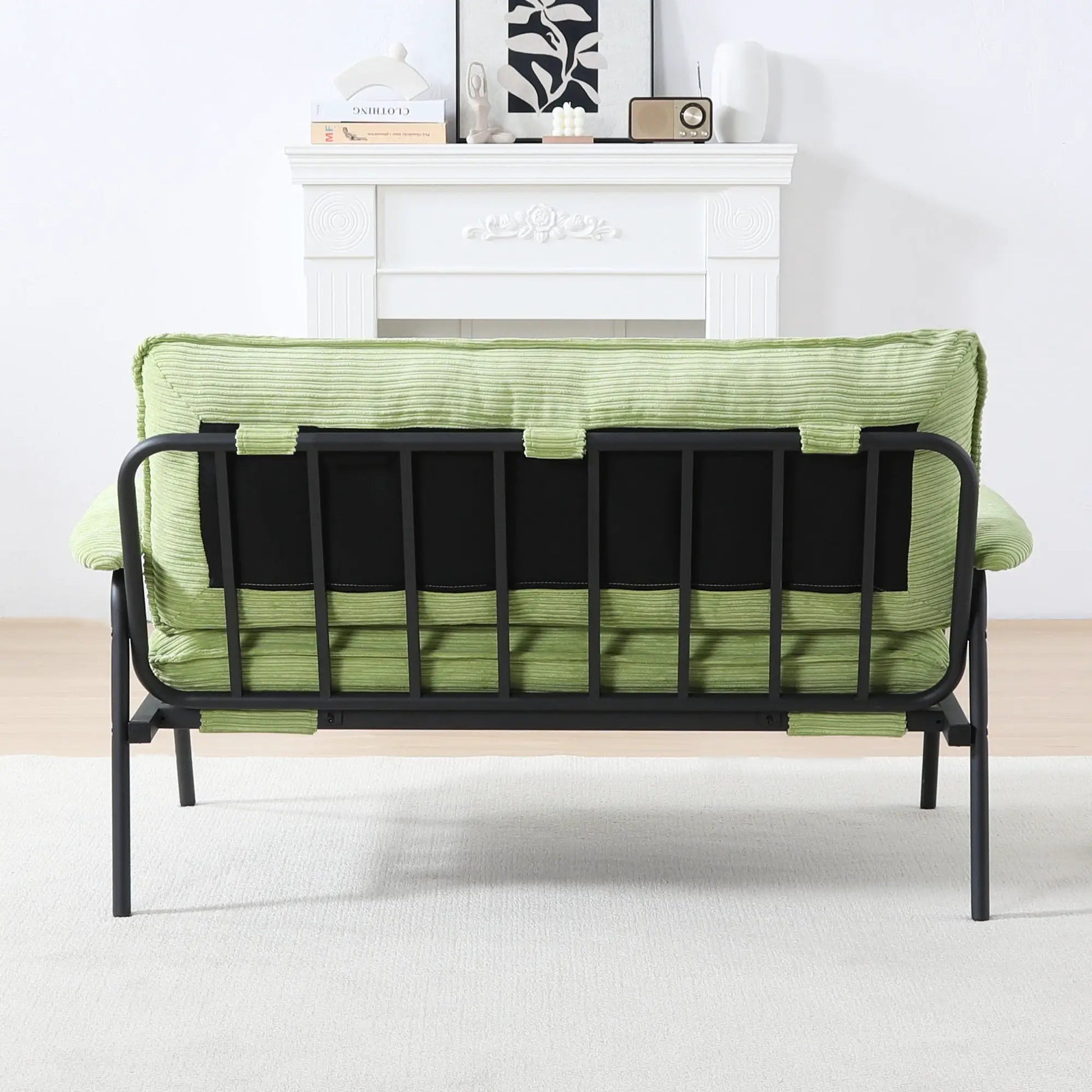 Modern metal frame stationary sofa with sponge-filled lime cushions and black frame on Tampa Home & Garden Store