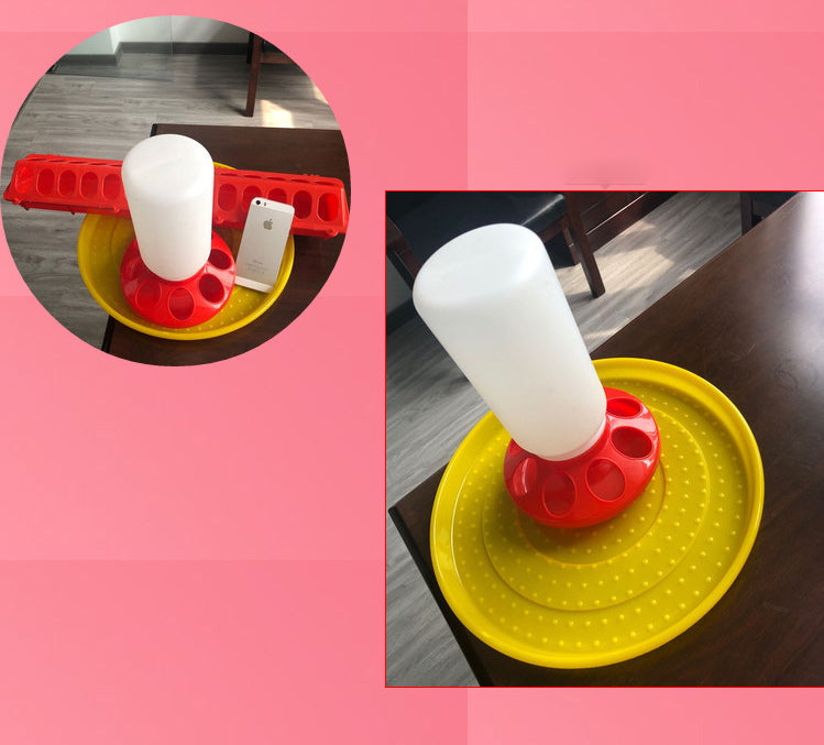 Bird feeder waterer with yellow dish, red hole ring, and white bottle on a wooden table on Tampa Home & Garden Store
