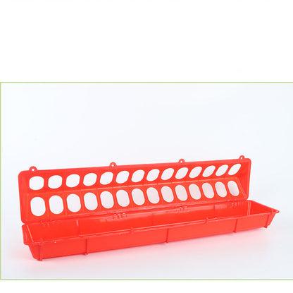 Red plastic bird feeder water trough with perforated back panel and mounting tabs on Tampa Home & Garden Store