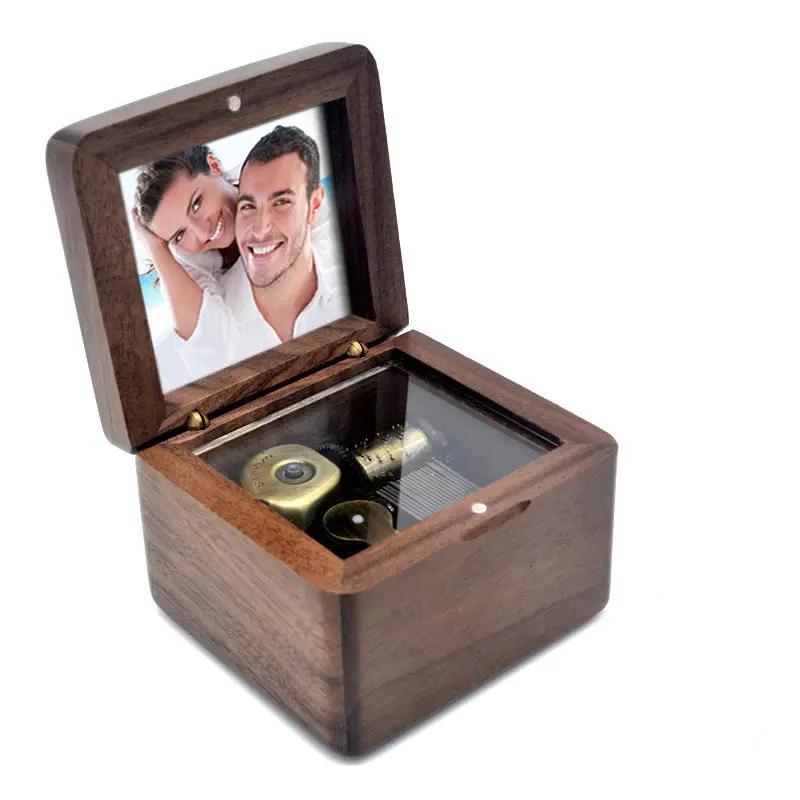 Wooden DIY music box with photo lid showing a couple photo and brass mechanism on Tampa Home & Garden Store
