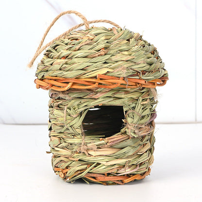 Handwoven straw bird cage nest with rustic green-brown weave and rope handle on Tampa Home & Garden Store