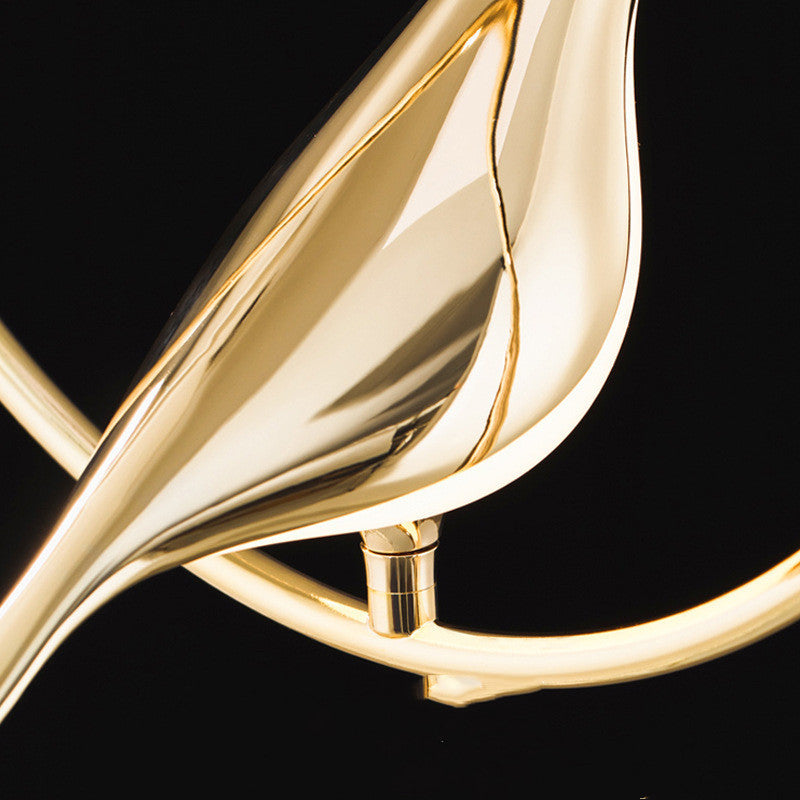 Modern Simplicity LED wall lamp in gold polished metal with a sleek curved form on Tampa Home & Garden Store