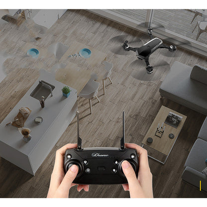 High-Definition Camera Aerial Drone with long flight time, black quadcopter shown with handheld remote on Tampa Home & Garden Store