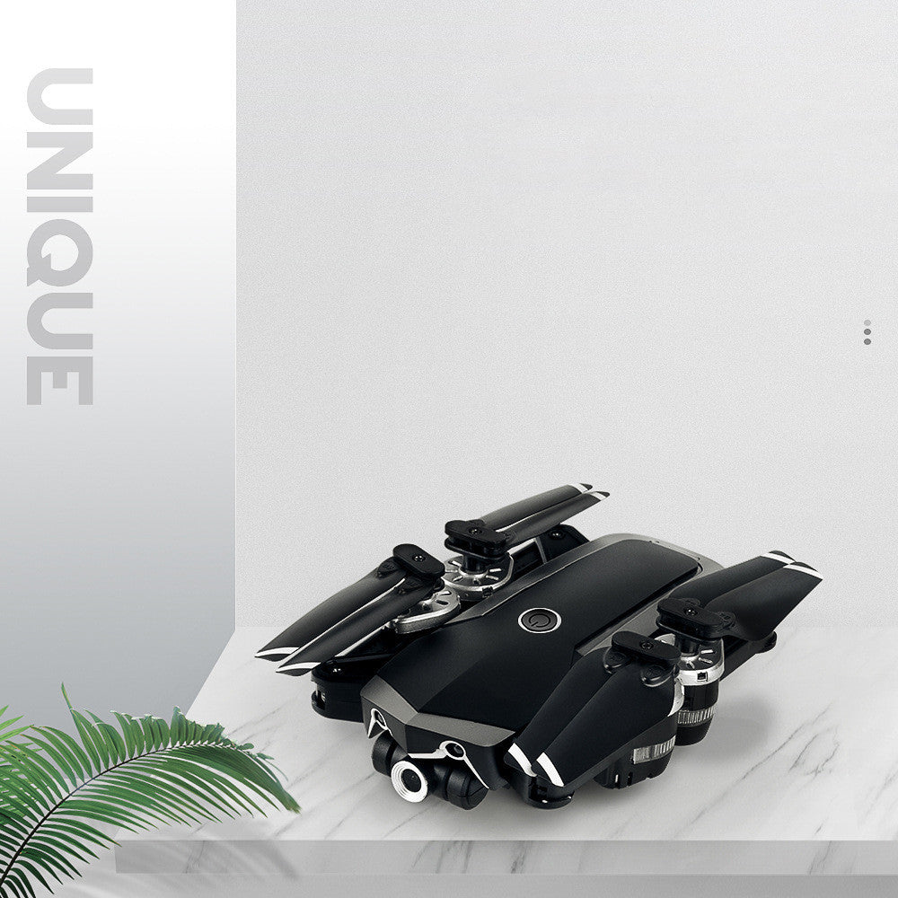Quadcopter drone Sell My Stuff black with folded propellers and high-def camera on Tampa Home & Garden Store