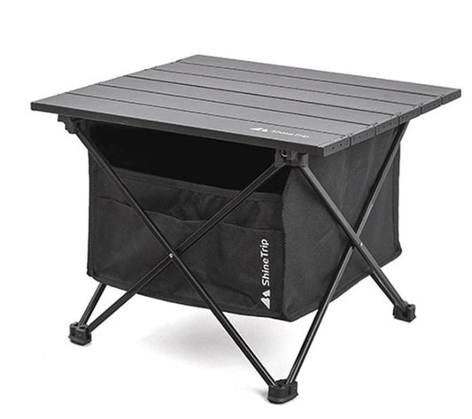 Folding outdoor table with aluminum slat top, cross-leg frame and ShineTrip storage bag on Tampa Home & Garden Store