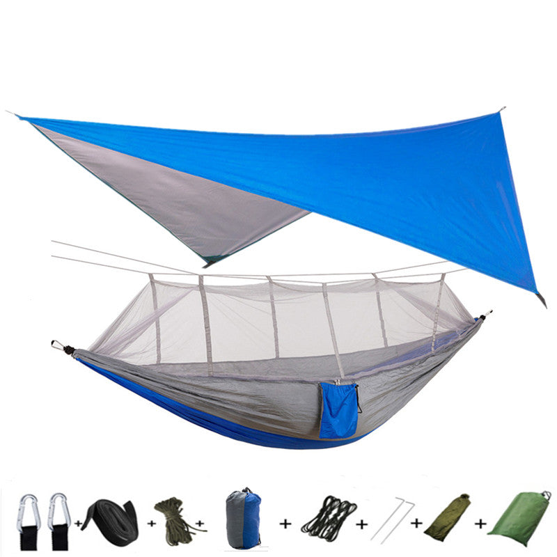 Outdoor parachute-cloth hammock with mosquito net, blue tarp and gray hammock body with straps on Tampa Home & Garden Store