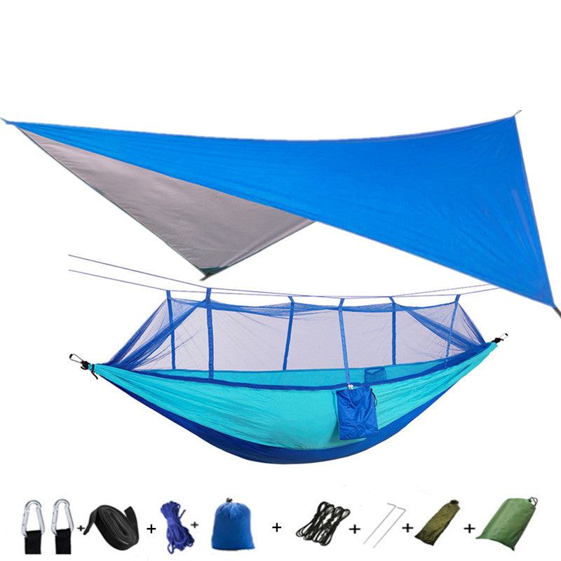 Blue and turquoise parachute hammock with mosquito net and tarp shelter, portable camping on Tampa Home & Garden Store