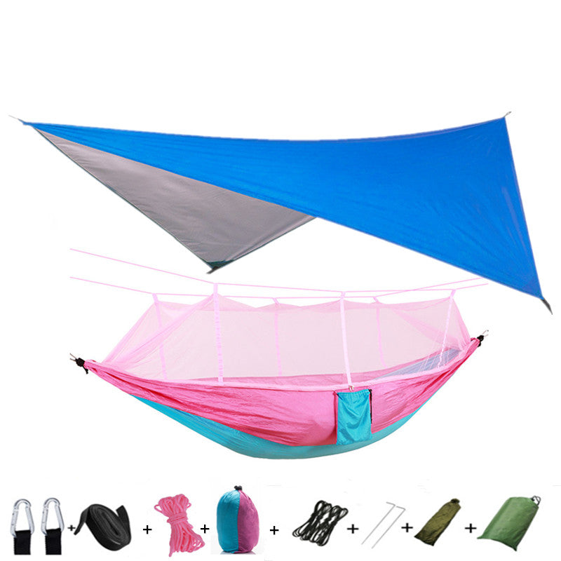 Outdoor parachute cloth double hammock with mosquito net and blue tarp shelter set on Tampa Home & Garden Store