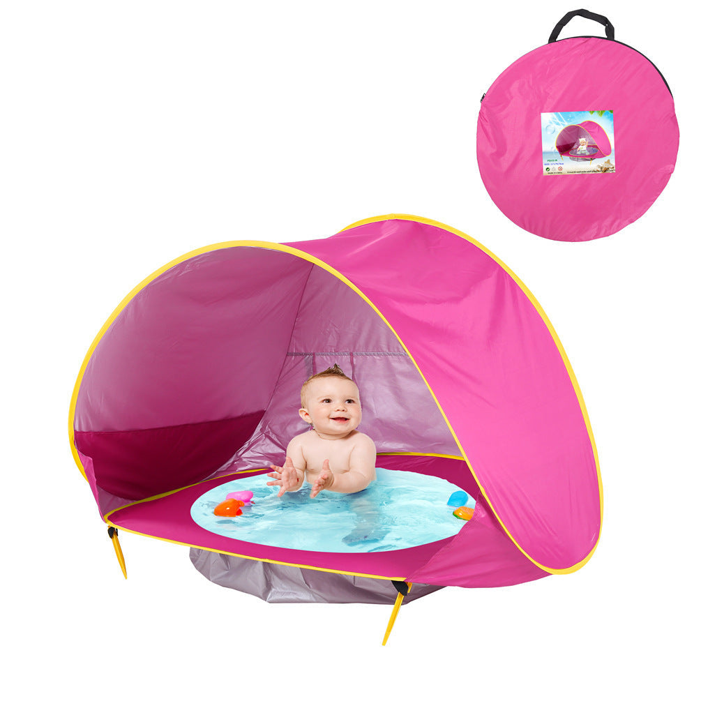 Pink baby beach tent with yellow trim, portable shade for infant pool play; includes carry bag on Tampa Home & Garden Store