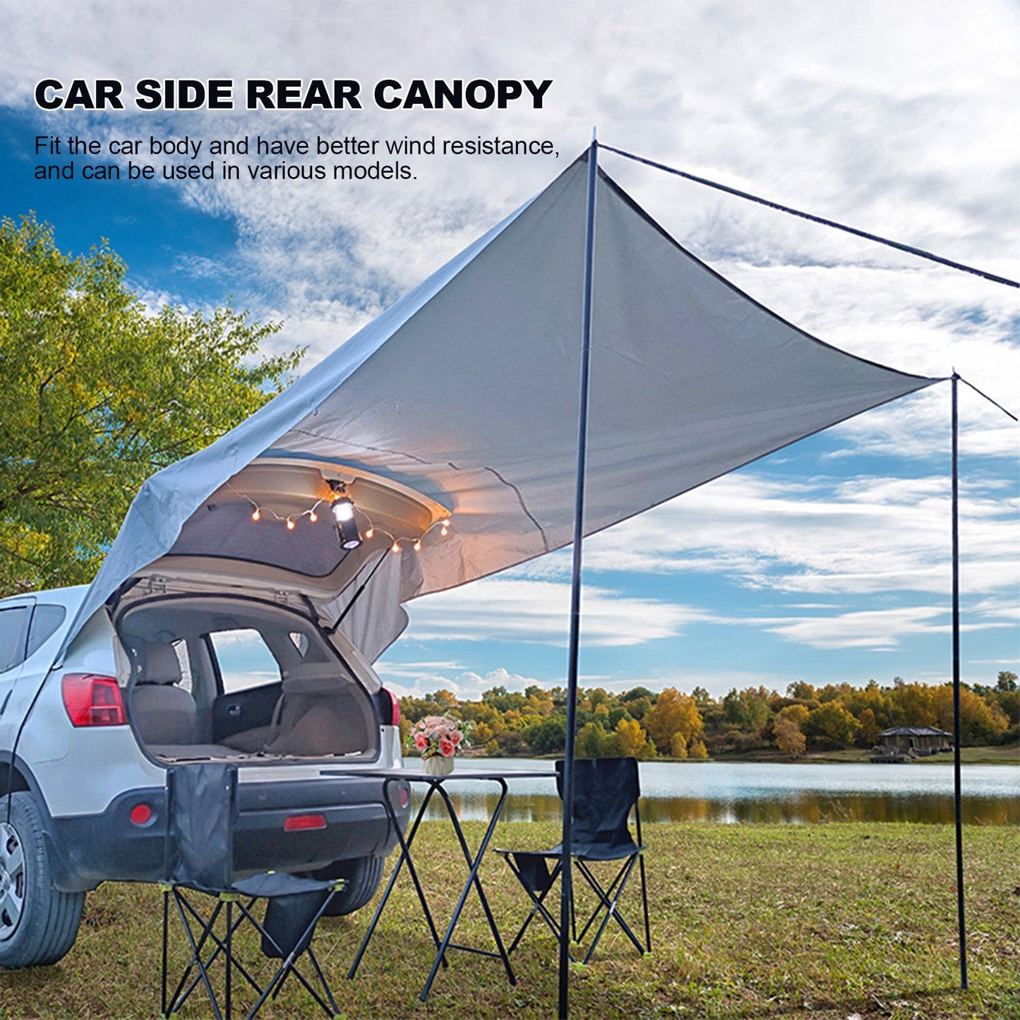 Car tail trunk canopy tent in light gray over SUV rear with pole frame and string lights on Tampa Home & Garden Store