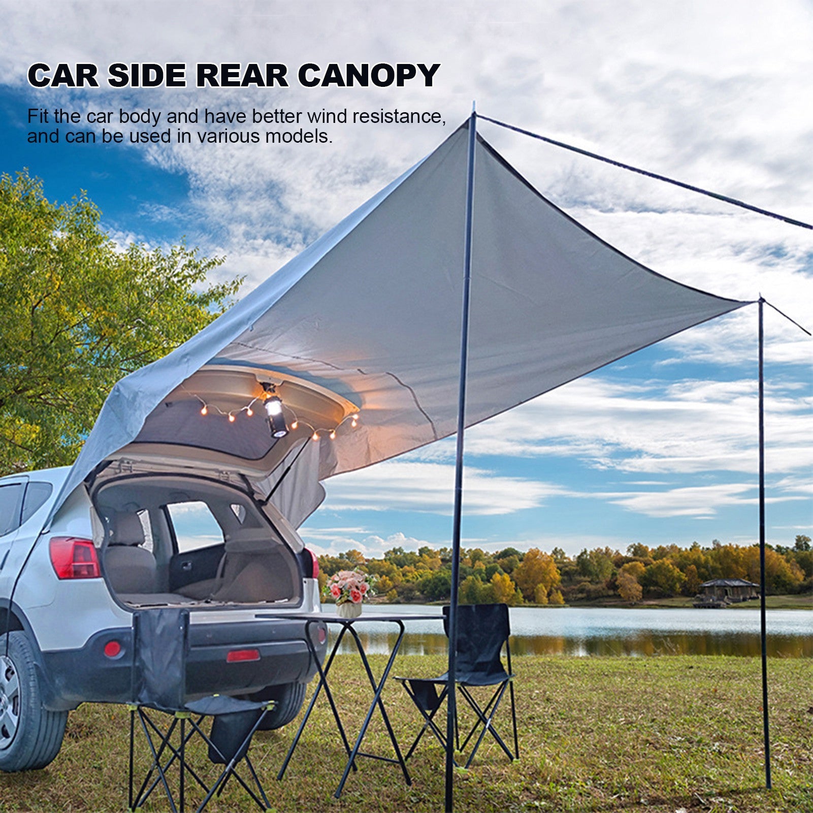 Car tail trunk canopy tent in light gray over SUV rear with pole frame and string lights on Tampa Home & Garden Store