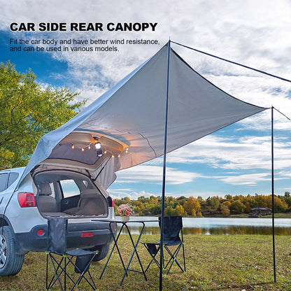 Car tail trunk canopy tent in light gray over SUV rear with pole frame and string lights on Tampa Home & Garden Store