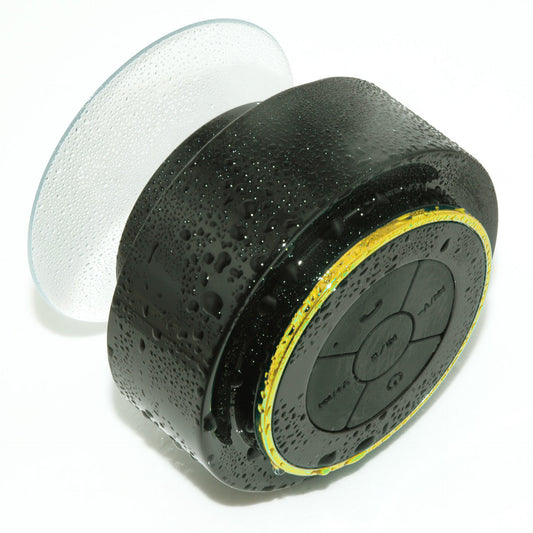Waterproof Bluetooth speaker circular black unit with yellow accent and suction-cup base on Tampa Home & Garden Store