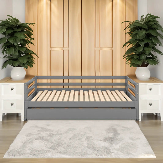 Gray twin daybed with trundle, metal frame and slatted base in a modern bedroom setup on Tampa Home & Garden Store