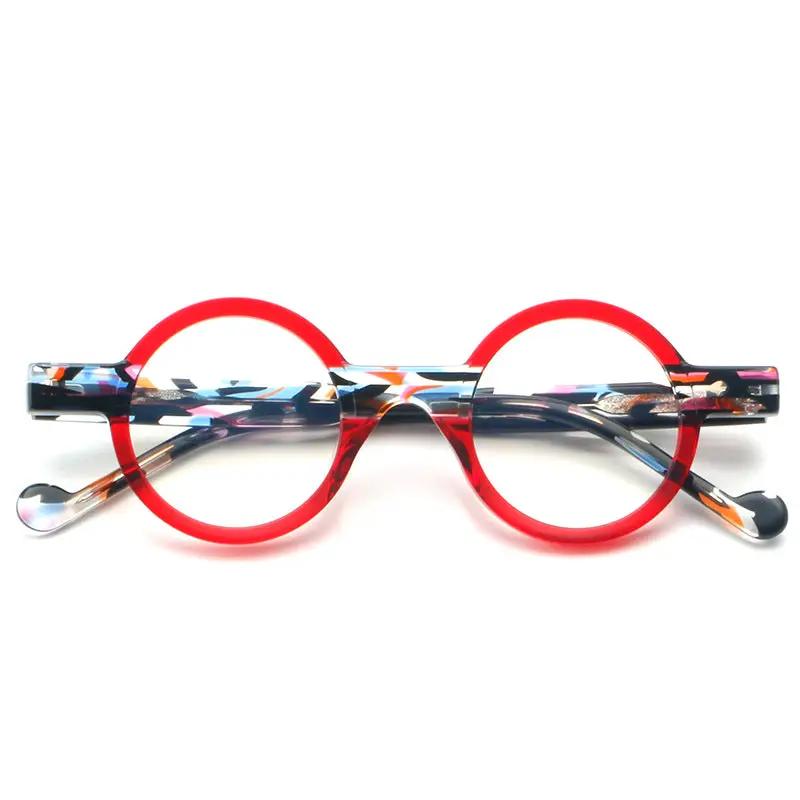 Retro round acetate glasses frame with bright red rims and multicolor patterned arms on Tampa Home & Garden Store