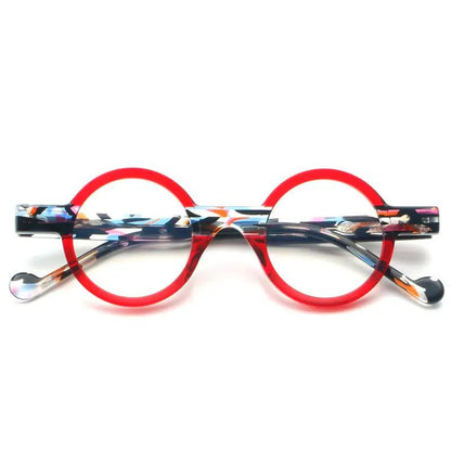 Retro round acetate glasses frame with bright red rims and multicolor patterned arms on Tampa Home & Garden Store