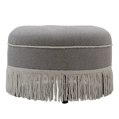 Yolanda round upholstered ottoman in grey fabric with rope trim and tassel fringe on Tampa Home & Garden Store