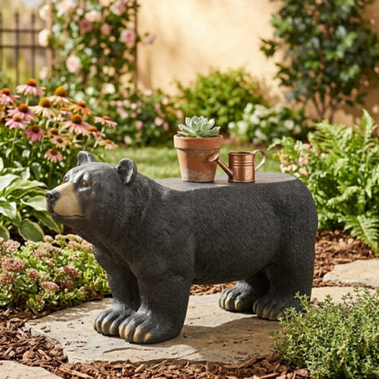 MGO Bear Bench concrete outdoor statue in dark gray with terracotta planter on its back on Tampa Home & Garden Store
