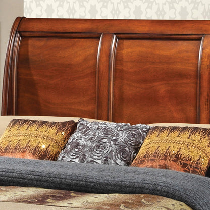 Dovetailed Storage Bed with dark brown wooden headboard; gold-gray decorative pillows on bed on Tampa Home & Garden Store
