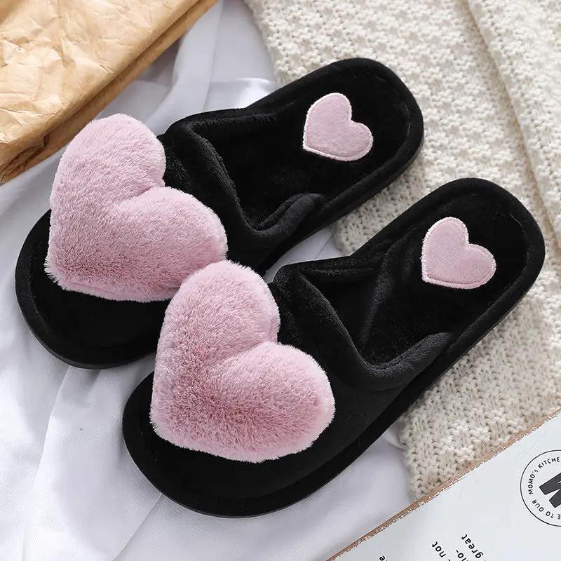 Women’s black fluffy heart slippers with pink plush hearts by FLIPSTYLEZLLC on Tampa Home & Garden Store
