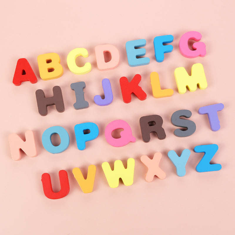 26 colorful wooden alphabet letters for Montessori toys with bright hues on pink background on Tampa Home & Garden Store