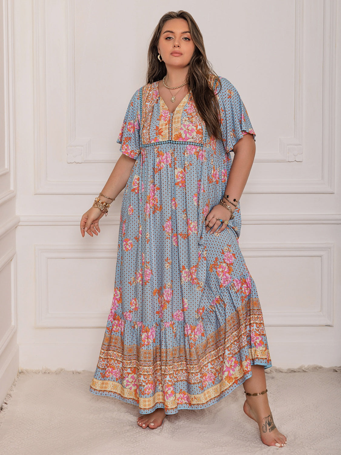Stevvex pink purple plus-size printed flutter-sleeve maxi dress, elegant flowy floral print on Tampa Home & Garden Store