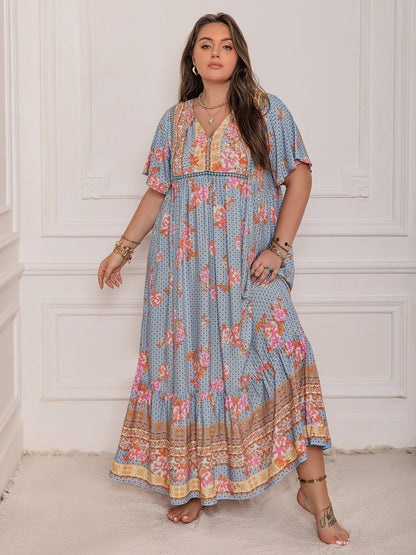 Stevvex pink purple plus-size printed flutter-sleeve maxi dress, elegant flowy floral print on Tampa Home & Garden Store