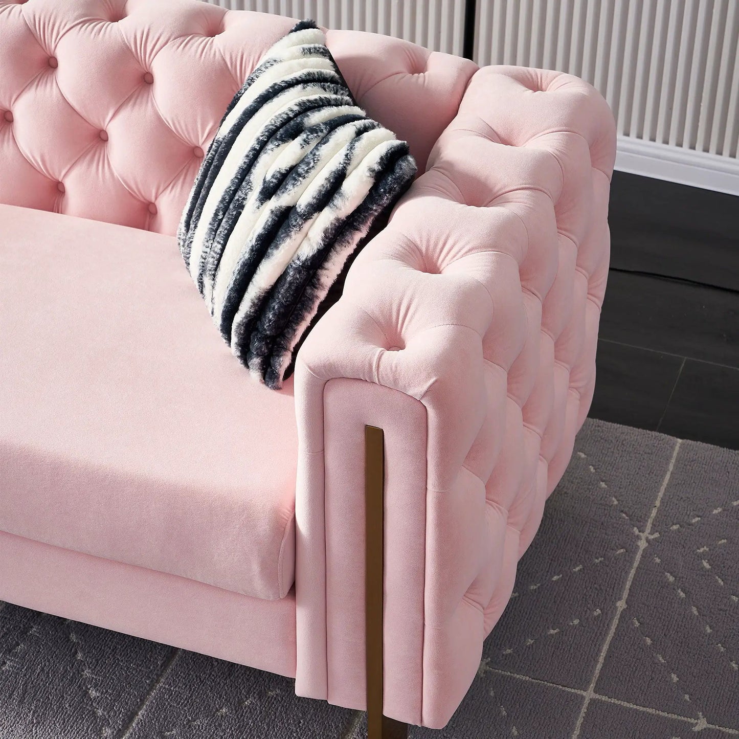 Chesterfield pink velvet sofa with tufted back and wooden legs striped faux fur throw on Tampa Home & Garden Store