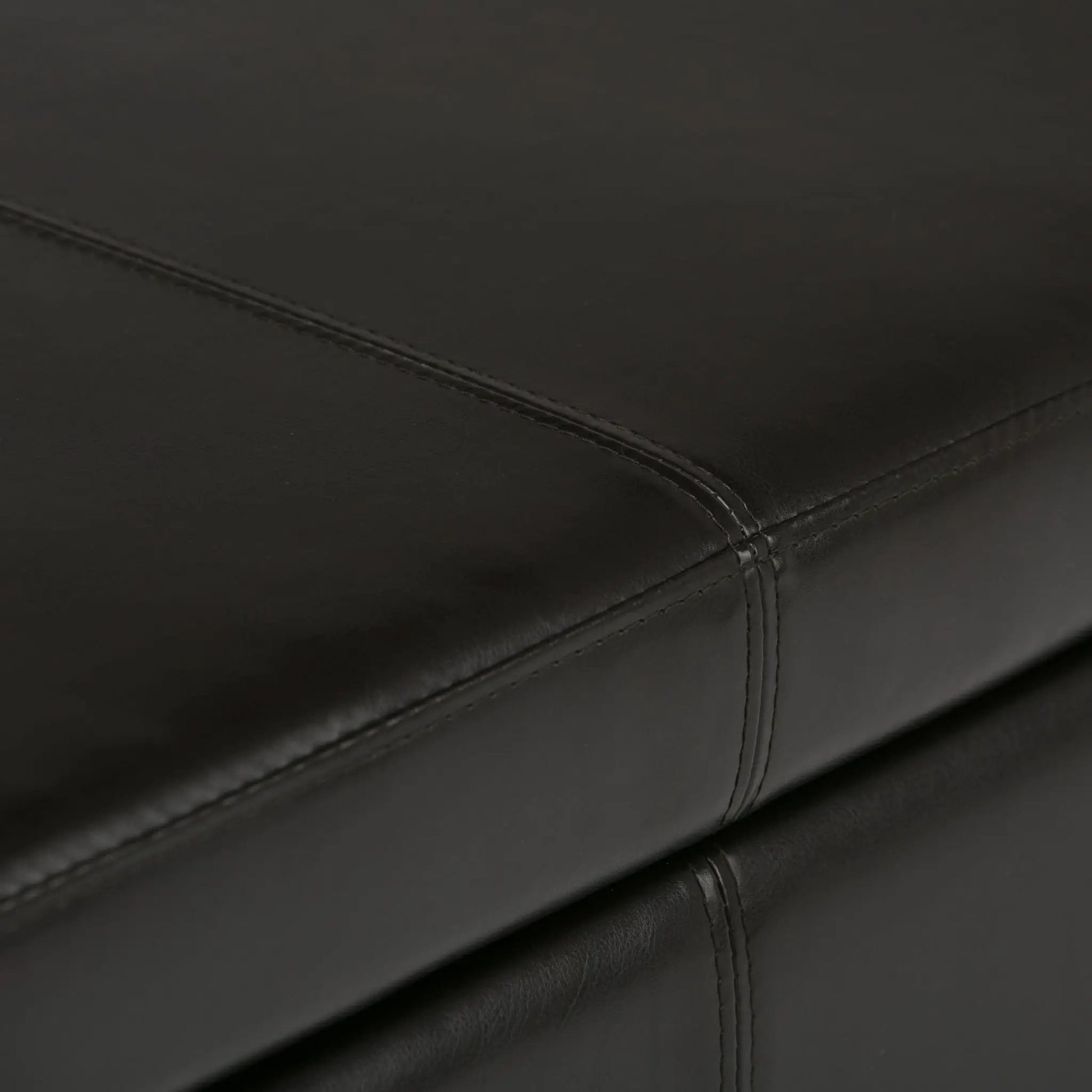 Avalon Multifunctional Storage Ottoman Bench in black leather with visible stitching on Tampa Home & Garden Store