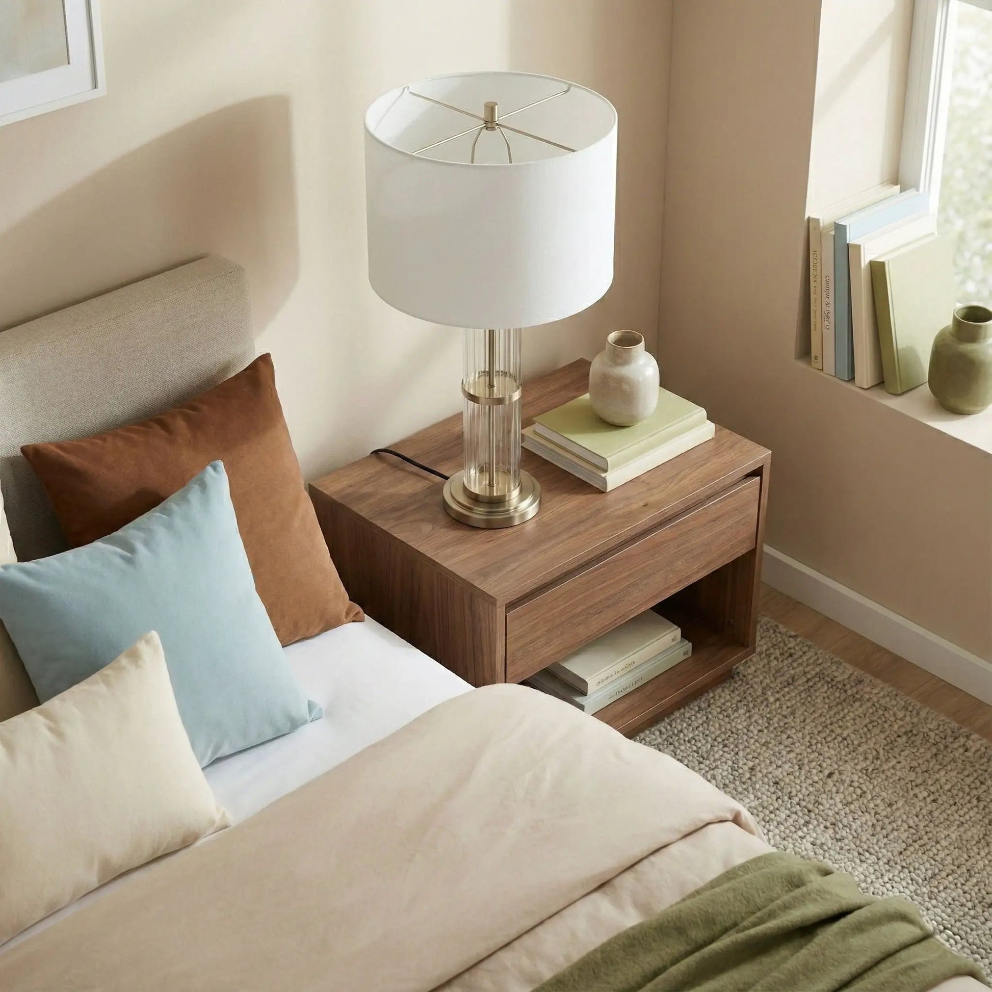 Echo table lamp with on/off switch, clear glass body, white shade and silver accents on Tampa Home & Garden Store