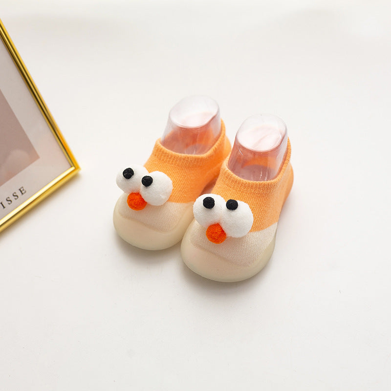Stevvex baby cotton anti-slip indoor socks pair in orange with cream toe and cartoon face on Tampa Home & Garden Store