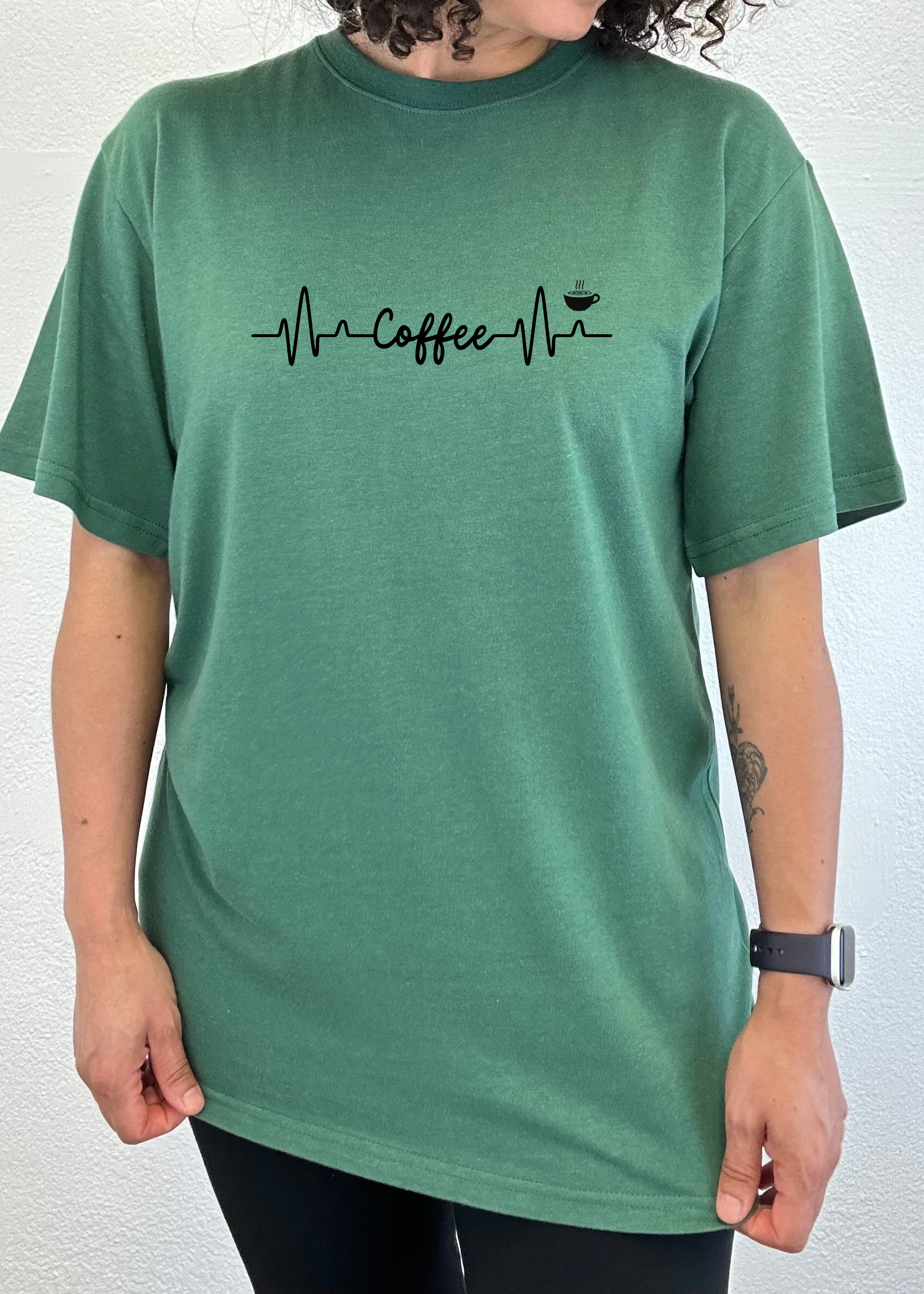 Heartbeat Coffee unisex bamboo/cotton graphic tee green with heartbeat line and coffee cup on Tampa Home & Garden Store