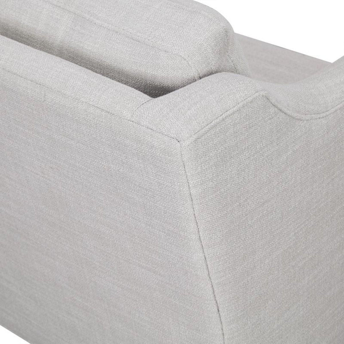 Beige arm chair fabric close-up with tufted cushions and visible seams on Tampa Home & Garden Store