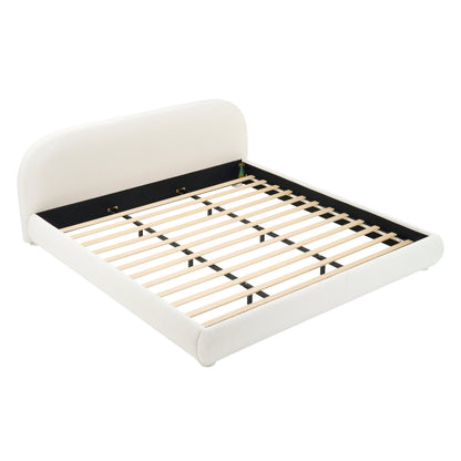 Cream fabric upholstered king bed frame with padded headboard and black side rails, wooden slats on Tampa Home & Garden Store