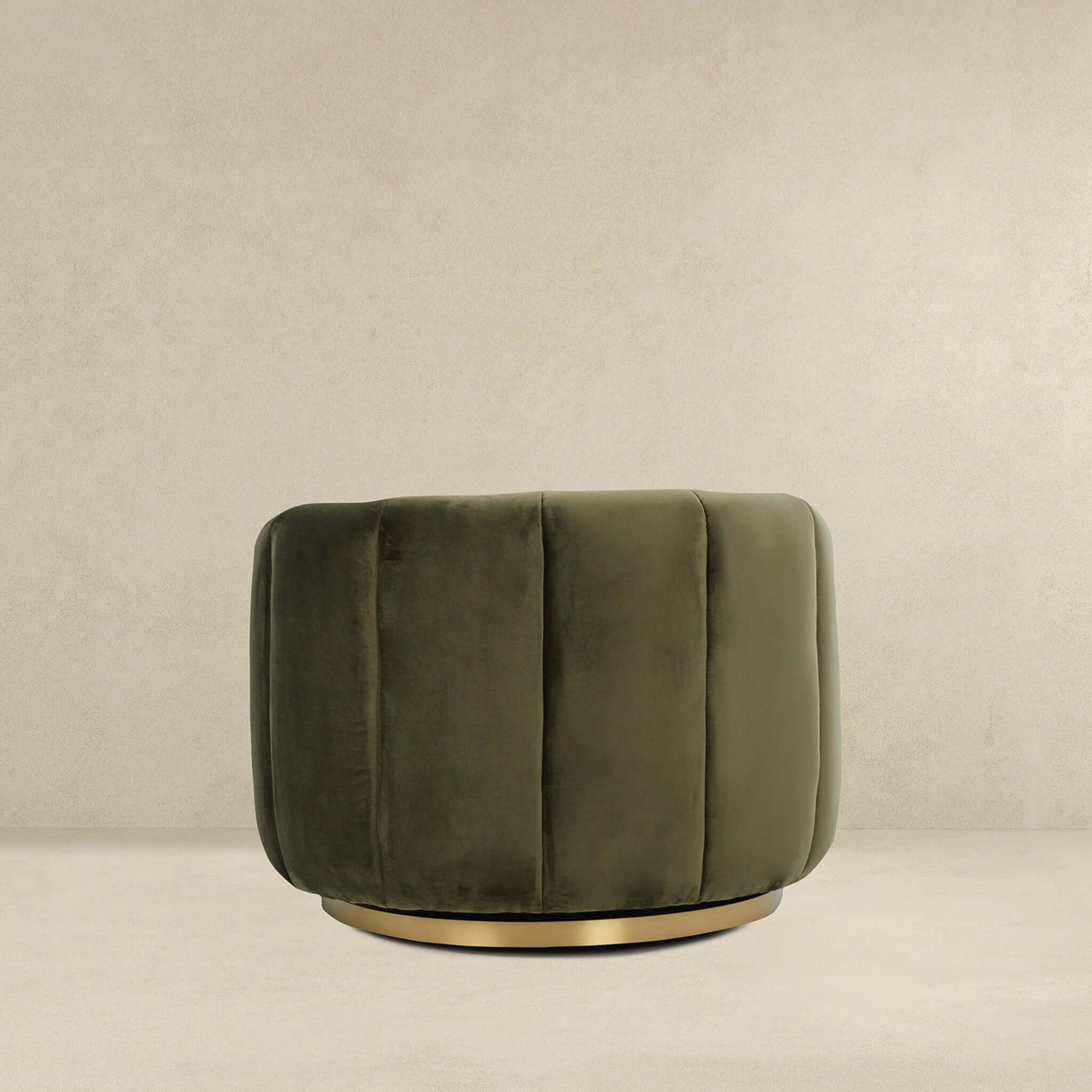 Cosey green velvet swivel chair bottom half with dark green upholstery and gold pedestal base on Tampa Home & Garden Store