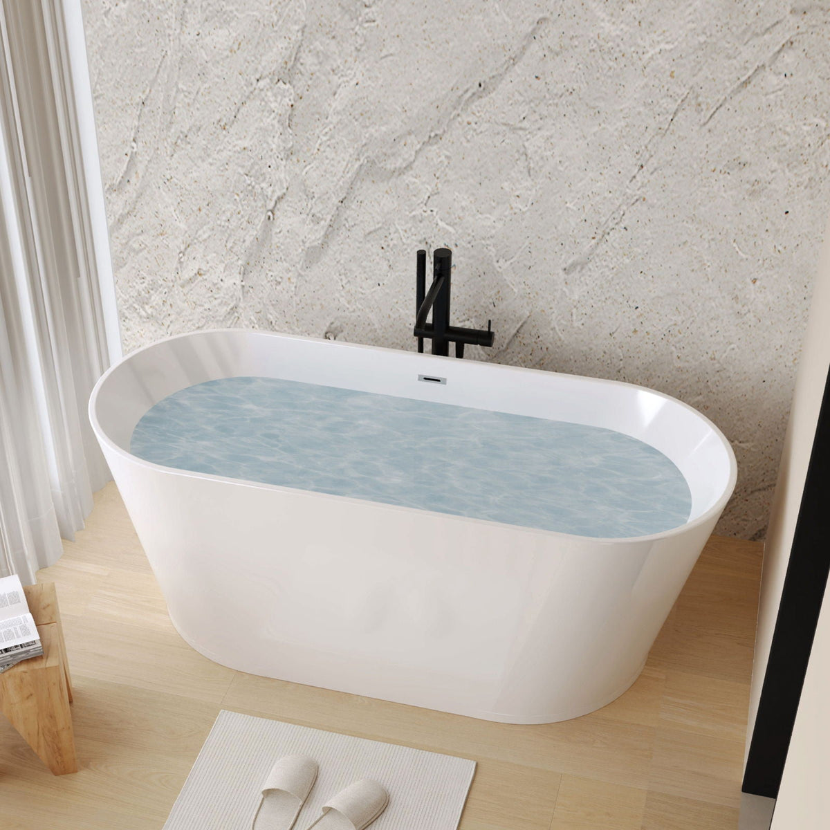 Glossy freestanding bathtub with toe-tap drain and black floor faucet, white acrylic on Tampa Home & Garden Store