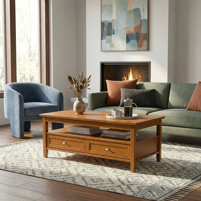 Warm Shaker coffee table in natural wood with two drawers and lower shelf in a cozy living room on Tampa Home & Garden Store