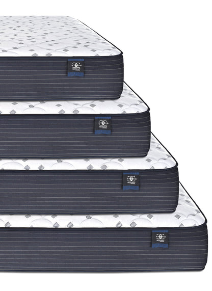 Restonic Comfortcare Hybrid Euro Top Mattress pinstripe sides white quilted top stacked on Tampa Home & Garden Store