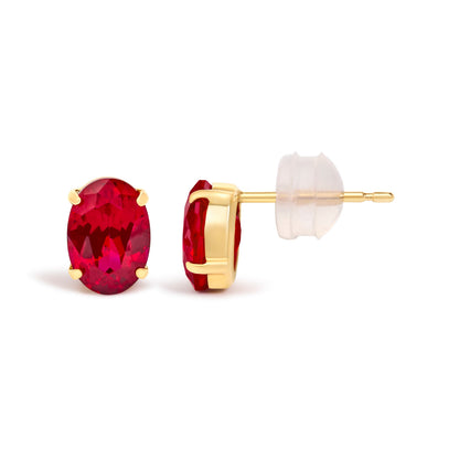18K yellow gold oval ruby stud earrings, 7x5 mm created rubies in prong settings on Tampa Home & Garden Store