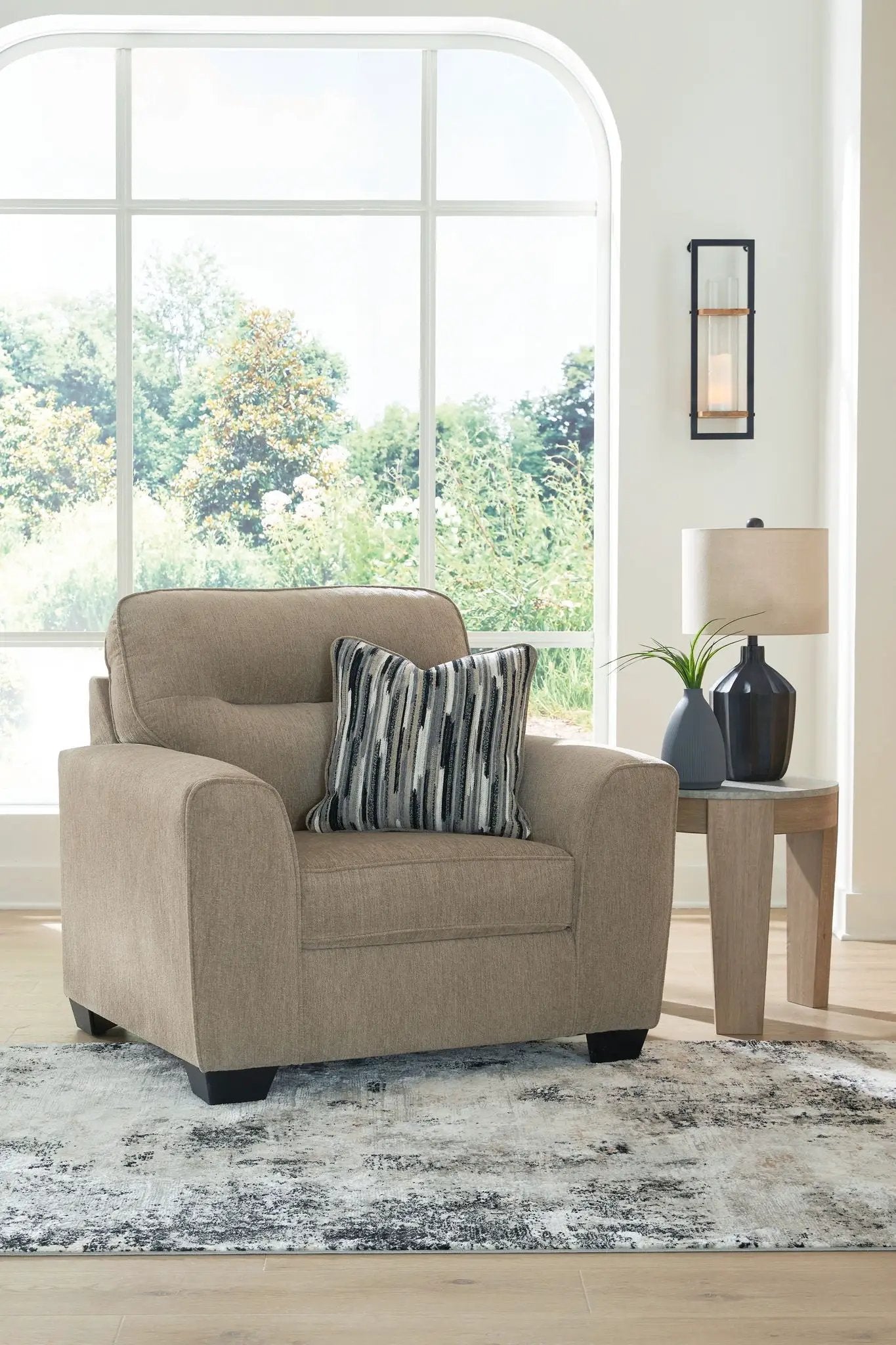 Olten stationary chair and ottoman in beige upholstery, Unique Piece Furniture living room set on Tampa Home & Garden Store