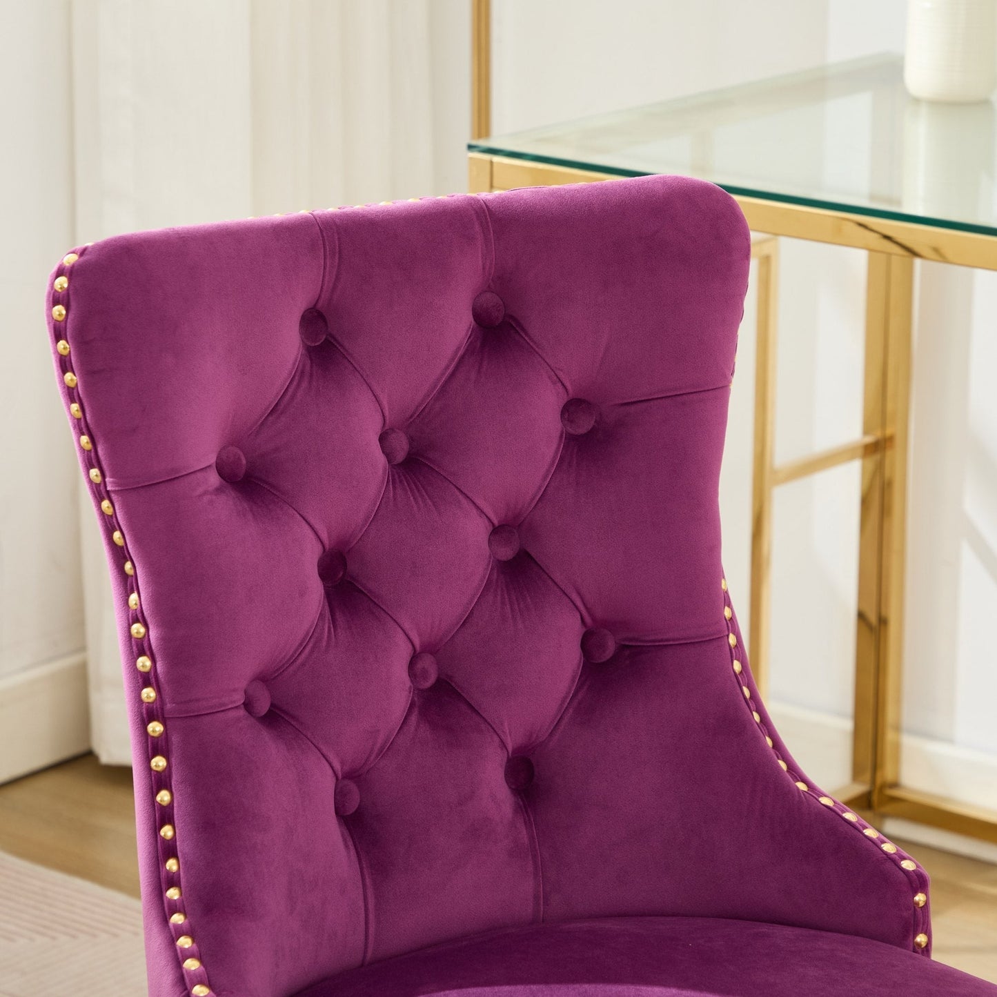 Office chair in purple velvet with tufted buttons and gold stud trim on Tampa Home & Garden Store